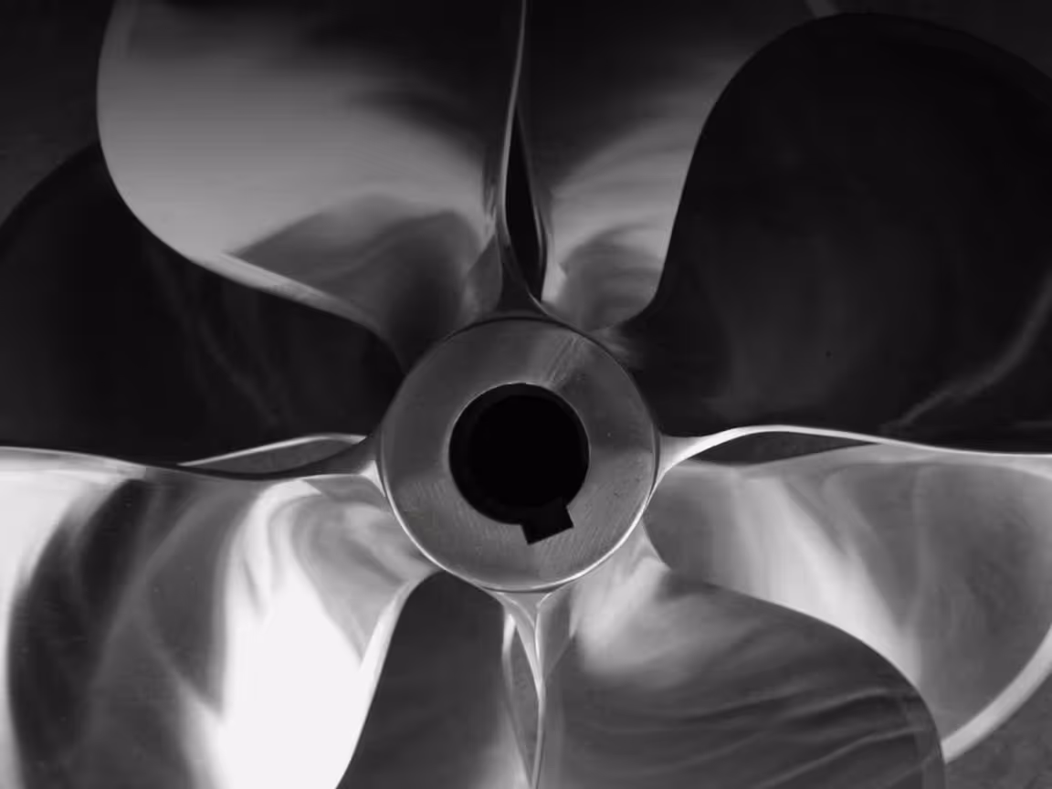 Repaired and polished four-blade marine propeller ready for installation