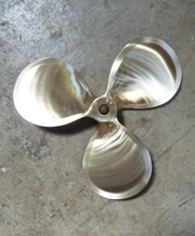 Finished three-blade bronze propeller after re-shaping and balancing